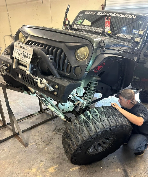 Lifted Jeep Wrangler with BDS suspension system being installed at San Antonio 4x4 shop